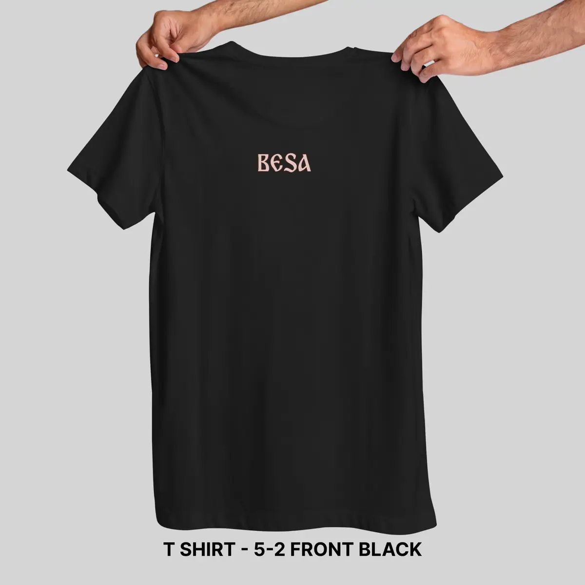 Black t-shirt front with small Besa chest mark